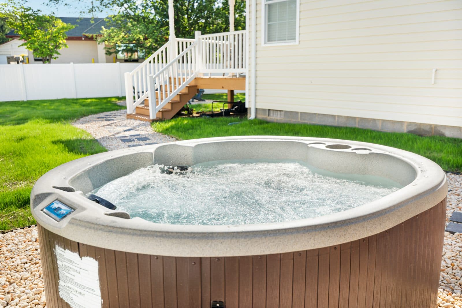 Private hot tub with the house in the background at Heart of Luray